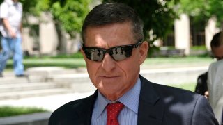In this June 24, 2019, file photo, President Donald Trump’s former National Security Adviser, Michael Flynn, leaves the E. Barrett Prettyman U.S. Courthouse in Washington, DC.