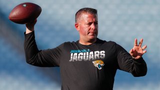 JACKSONVILLE, FLORIDA – AUGUST 29: Offensive Coordinator John DeFilippo of the Jacksonville Jaguars throws a pass before the start of a preseason game against the Atlanta Falcons at TIAA Bank Field on August 29, 2019 in Jacksonville, Florida. (Photo by James Gilbert/Getty Images)