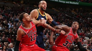 CHICAGO, IL – JANUARY 2: Daniel Gafford #12 of the Chicago Bulls and Rudy Gobert #27 of the Utah Jazz fights for position to grab the rebound on January 2, 2020 at the United Center in Chicago, Illinois. NOTE TO USER: User expressly acknowledges and agrees that, by downloading and or using this photograph, user is consenting to the terms and conditions of the Getty Images License Agreement. Mandatory Copyright Notice: Copyright 2020 NBAE (Photo by Gary Dineen/NBAE via Getty Images)