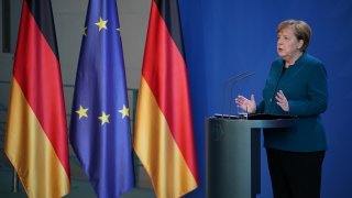 German Chancellor Angela Merkel speaks to the media