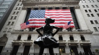 In this March 29, 2020, file photo, the New York Stock Exchange building is seen in the Financial District of New York City.