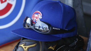 A Cubs hat sits on a bench at the team's spring training facility in Arizona