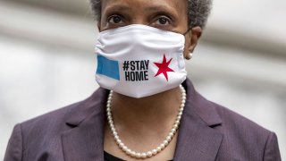 Chicago mayor Lori Lightfoot wears a mask