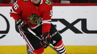 Blackhawks forward Matthew Highmore skates with the puck during a February game
