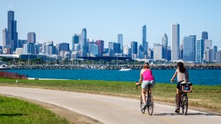 Cyclists ride along Lake Michigan in Chicago