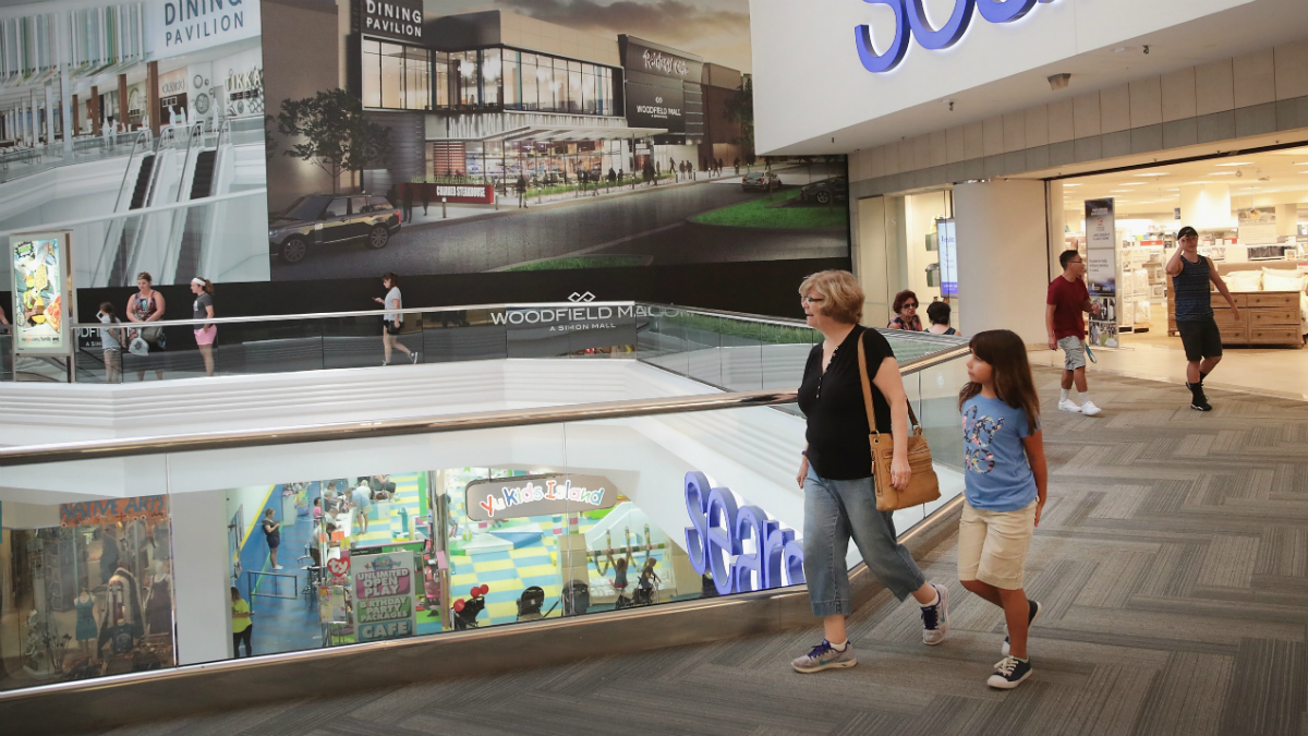Woodfield Mall still draws shoppers even as other suburban centers fail