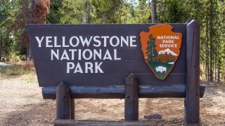 Welcome sign by West Yellowstone, USA to Yellowstone National Park north Entrance