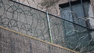 Razor wire sits on a fence at the Metropolitan Correctional Center June 9, 2009 in New York City