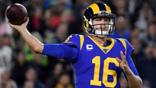 Quarterback Jared Goff #16 of the Los Angeles Rams drops back to pass over the defense of the Seattle Seahawks during the game at Los Angeles Memorial Coliseum on Dec. 8, 2019 in Los Angeles, California.