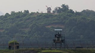 Military guard posts of North Korea, rear, and South Korea, foreground, are seen in Paju, at the border with North Korea, South Korea, Tuesday, June 16, 2020.