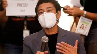 Rappler CEO and Executive Editor Maria Ressa gestures during a press conference near the Manila Regional Trial Court in Manila, Philippines on Monday June 15, 2020. Ressa, an award-winning journalist critical of the Philippine president, was convicted of libel and sentenced to jail Monday in a major blow to press freedom in an Asian bastion of democracy.