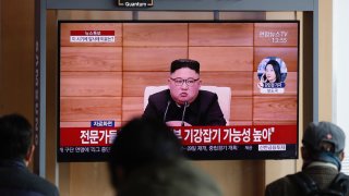 In this March 2, 2020, file photo, South Korean TV airs file footage of North Korean leader Kim Jong Un at the Seoul Railway Station in Seoul, South Korea.
