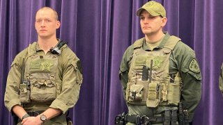 Chicago SWAT officers Shane Coleman and Peter Jonas are honored after saving a man from the icy waters of Lake Michigan
