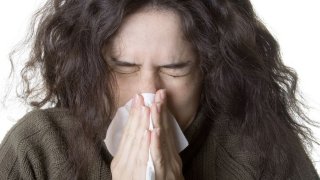 Sneeze flu symptom