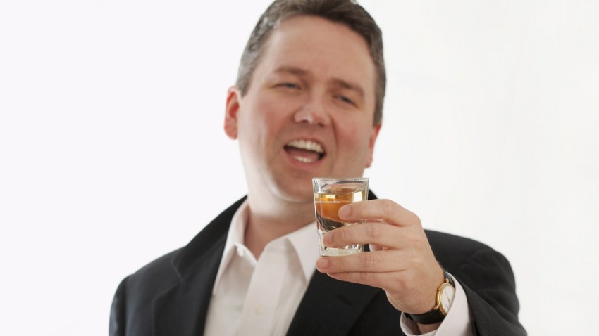 businessman with shot glass