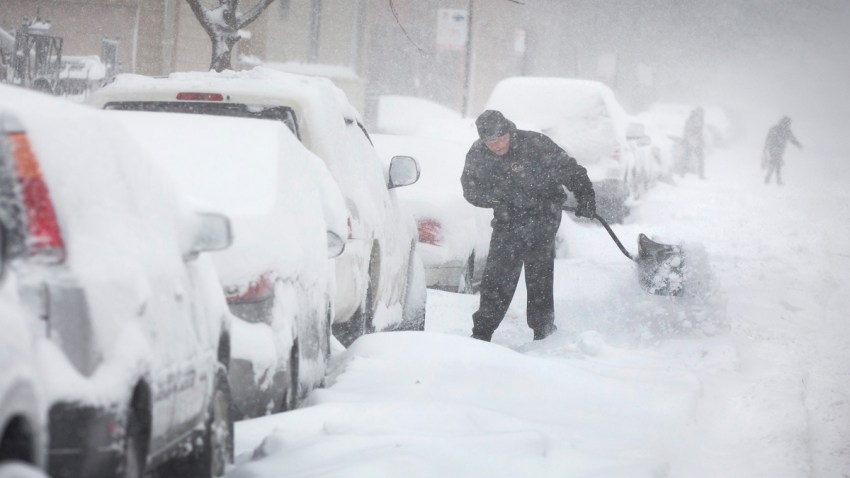 Winter Weather - Man Digging