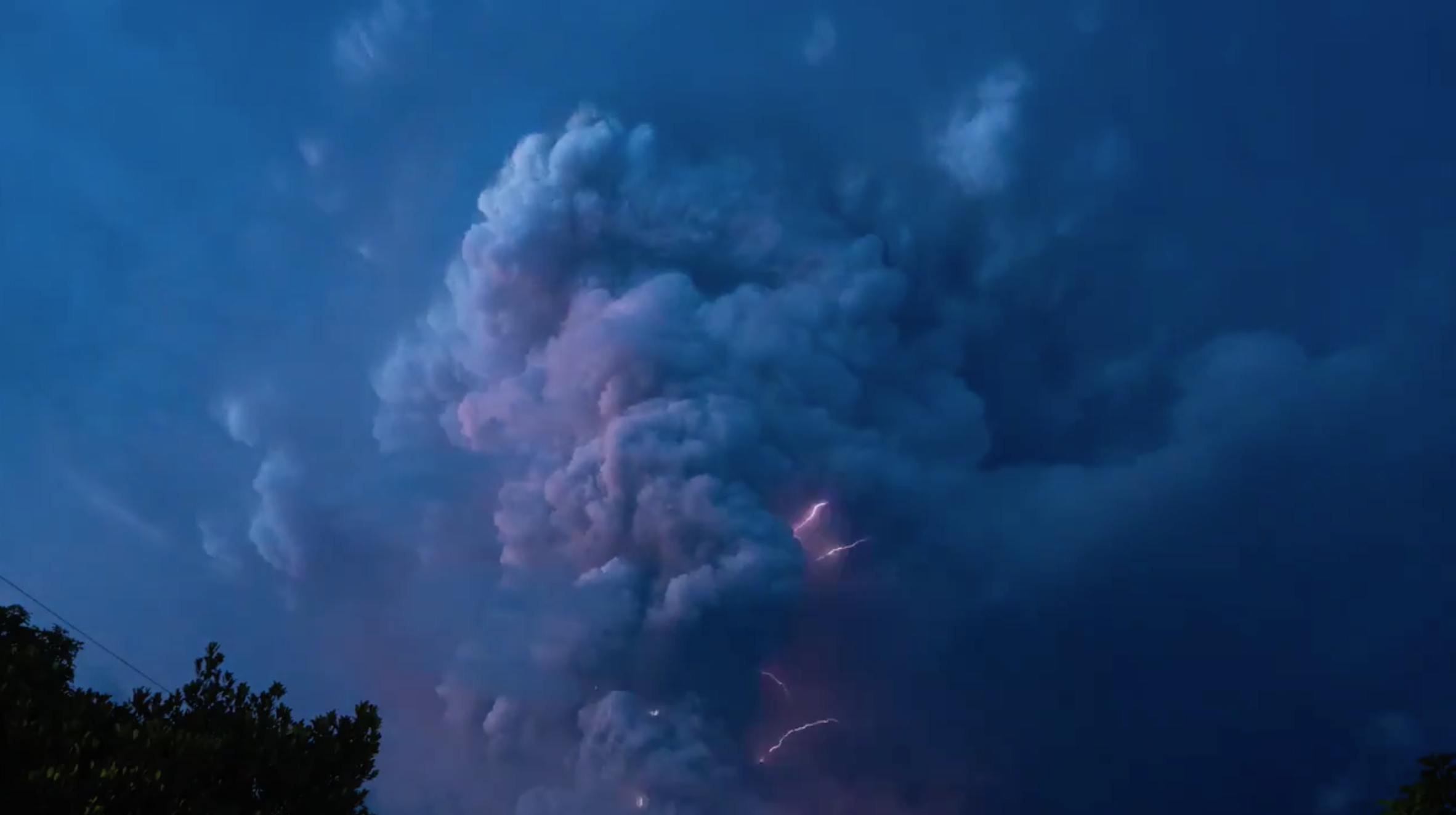 Lightning race across a billowing ash cloud as the Taal volcano erupts, spewing fume, ash and pebbles miles-high into the sky over Lake Taal, Philippines, Jan. 12, 2020.