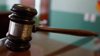 In this Feb. 2, 2009, file photo, a judge's gavel rests on top of a desk in the courtroom of the newly opened Black Police Precinct and Courthouse Museum in Miami, Florida.