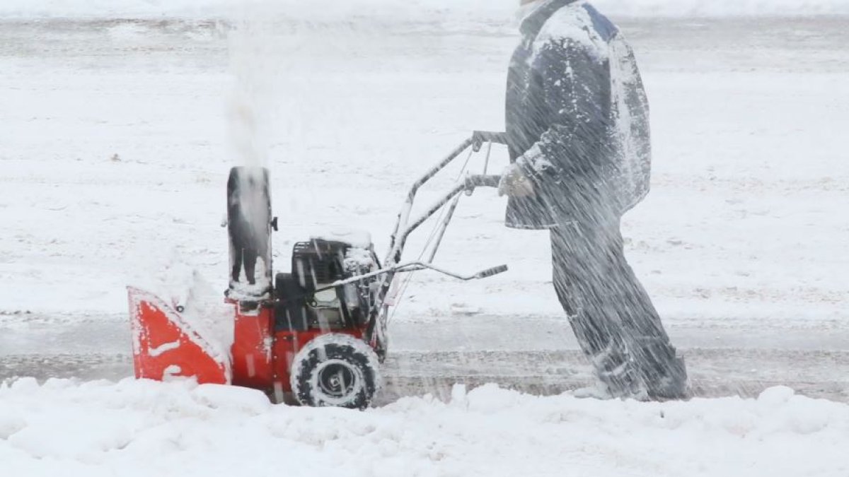 Suburban man injures fingers after reaching into snow blower during winter storm