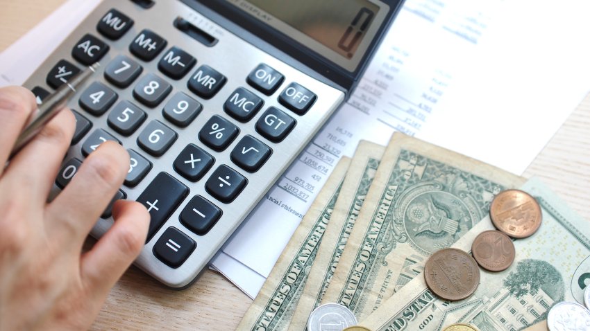 stock photo of someone doing taxes