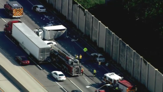 photo shows aftermath of crash involving box truck and car on I-294