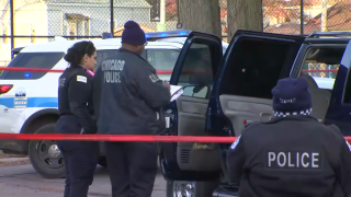 Chicago police investigate the shooting of a 21-year-old woman in Brighton Park on Thursday