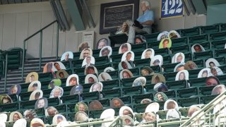 Milwaukee Brewers' fans are seen on picture cut outs in the upper deck during a practice session Monday, July 13, 2020, at Miller Park in Milwaukee.