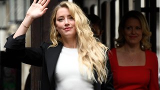 Amber Heard arrives at High Court, in London, Monday, July 27, 2020. Hollywood actor Johnny Depp is suing News Group Newspapers over a story about his former wife Amber Heard, published in The Sun in 2018 which branded him a 'wife beater', a claim he denies.