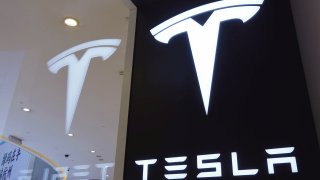 A Tesla logo is seen at a Tesla store on April 21, 2020 in Hangzhou, Zhejiang Province of China.