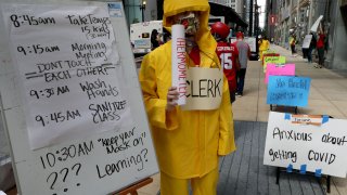 Teacher Andrew Van Herik protests outside Chicago Public Schools headquarters