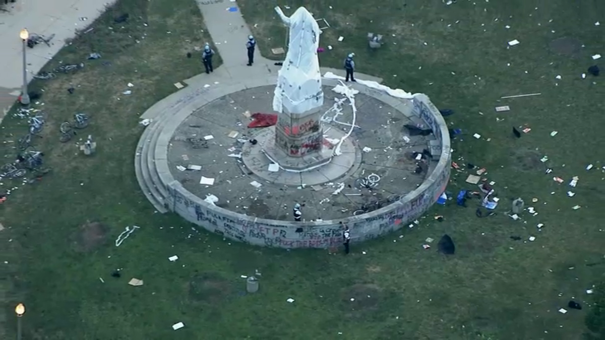 Police and Protesters Clash at Grant Park, Christopher Columbus Statue
