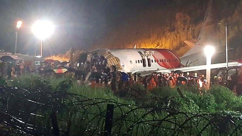An Air India Express flight skidded off a runway while landing at the airport in Kozhikode, Kerala, India, Friday, Aug. 7, 2020.