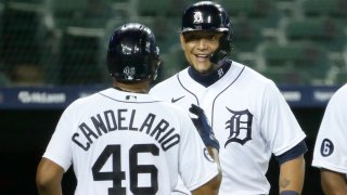 DETROIT, MI – AUGUST 26: Miguel Cabrera #24 of the Detroit Tigers greets Jeimer Candelario #46 after both scored against the Chicago Cubs on a double by Niko Goodrum in the sixth inning at Comerica Park on August 26, 2020, in Detroit, Michigan. (Photo by Duane Burleson/Getty Images)
