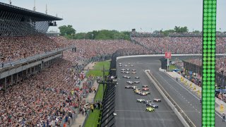 IndyCar driver Simon Pagenaud (22) of the Menards Team Penske Chevrolet leads the field tot he green flag for the start of the NTT IndyCar Series 103rd running of the Indianapolis 500 on May 26, 2019, at the Indianapolis Motor Speedway in Indianapolis