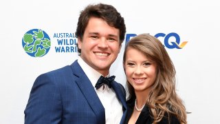 Bindi Irwin poses for a photo with fiancé Chandler Powell