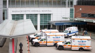 Ambulances pull up to Massachusetts General Hospital in Boston on April 20, 2020.
