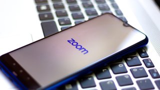 BRAZIL – 2020/04/20: In this photo illustration a Zoom Video Communications logo seen displayed on a smartphone. (Photo Illustration by Rafael Henrique/SOPA Images/LightRocket via Getty Images)