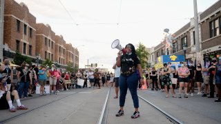 Missouri Democratic congressional candidate Cori Bush leads protesters as they take to the street to protest against police brutality on June 12, 2020 in University City, Missouri.