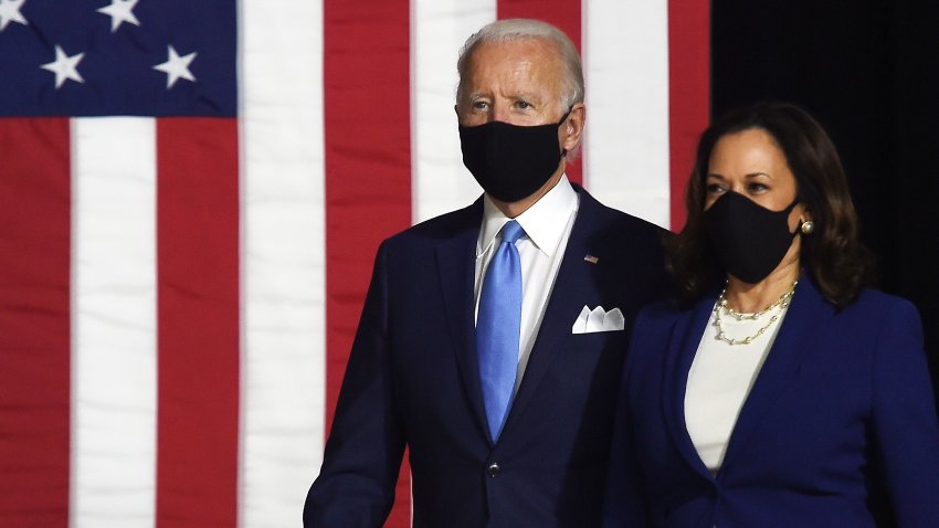 Democratic presidential nominee and former US Vice President Joe Biden (L) and vice presidential running mate, US Senator Kamala Harris, arrive to conduct their first press conference together in Wilmington, Delaware, on August 12, 2020. (Photo by Olivier DOULIERY / AFP) (Photo by OLIVIER DOULIERY/AFP via Getty Images)