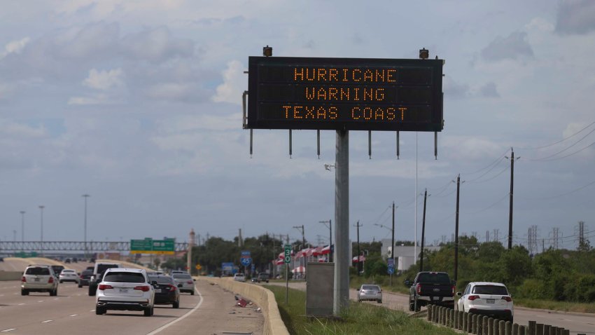 GALVESTON, TX –  A sign on northbound I45 warns drivers about approaching Hurricane Laura on August 25, 2020 in Galveston, Texas. Laura rapidly strengthened to a Category 4 hurricane during the day, prompting the National Hurricane Center to describe the accompanying storm surge as “unsurvivable” and noted it could penetrate up to 30 miles inland from the immediate coastline. (Photo by Thomas B. Shea/Getty Images)