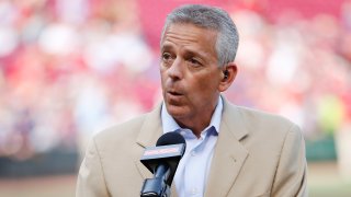 In this June 16, 2017, file photo, Cincinnati Reds television broadcaster Thom Brennaman looks on prior to a game against the Los Angeles Dodgers at Great American Ball Park in Cincinnati, Ohio.