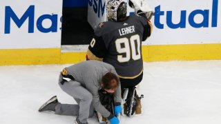 EDMONTON, ALBERTA – AUGUST 11: An equipment manager works on the broken skate of Robin Lehner #90 of the Vegas Golden Knights against the Chicago Blackhawks during the second period in Game One of the Western Conference First Round during the 2020 NHL Stanley Cup Playoffs at Rogers Place on August 11, 2020 in Edmonton, Alberta. (Photo by Jeff Vinnick/Getty Images)