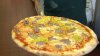 Prankster pretends to steal $10 from Michigan pizza worker. His response struck a chord online