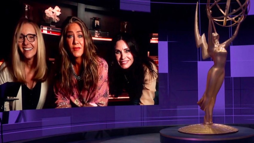 In this video grab captured on Sept. 20, 2020, courtesy of the Academy of Television Arts & Sciences and ABC Entertainment, Jimmy Kimmel, right, speaks with actors, from left, Lisa Kudrow, Jennifer Aniston and Courteney Cox during the 72nd Emmy Awards broadcast.