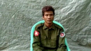 In this image taken from video provided by the Arakan Army, Private Zaw Naing Tun provides a video testimony from an undisclosed location somewhere in Myanmar on July 8, 2020. Two soldiers who deserted from Myanmar’s army have testified on video that they were instructed by commanding officers to “shoot all that you see and that you hear” in villages where minority Rohingya Muslims lived, a human rights group said Tuesday, Sept. 8, 2020.