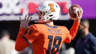 Quarterback Brandon Peters #18 of the Illinois Fighting Illini warms up prior to the start of the RedBox Bowl game against the California Golden Bears at Levi's Stadium