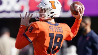 Quarterback Brandon Peters #18 of the Illinois Fighting Illini warms up prior to the start of the RedBox Bowl game against the California Golden Bears at Levi's Stadium