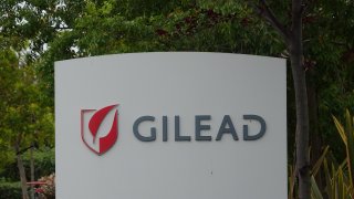 Sign with logo for pharmaceutical company Gilead in the Silicon Valley, Foster City, California, April 11, 2020.