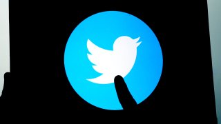 FILE - In this photo illustration, Twitter logos are displayed on a tablet screen, in Ankara, Turkey, Aug. 19, 2020.