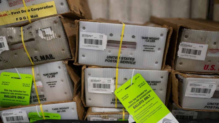Pallets filled with Washington and Oregon mail-in ballots
